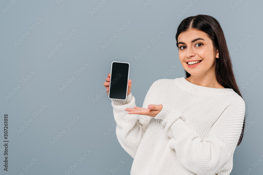pretty brunette girl in white sweater isolated on grey pretty brunette girl in white sweater isolated on grey
