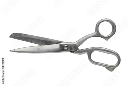 Vintage tailor scissors isolated on white. photo
