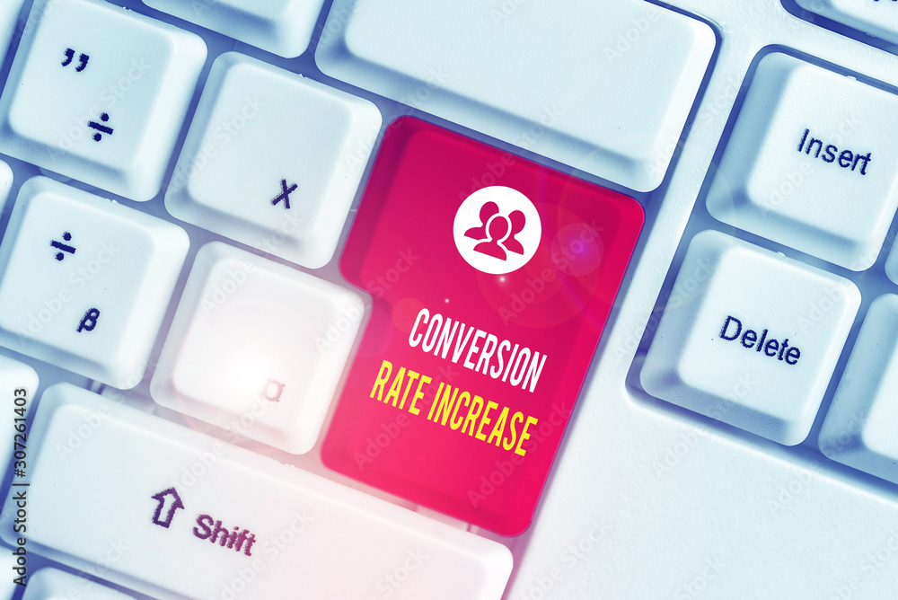 Text sign showing Conversion Rate Increase. Business photo text Ratio of Total Visitors who perform desired actions White pc keyboard with empty note paper above white background key copy space Text sign showing Conversion Rate Increase. Business photo text Ratio of Total Visitors who perform desired actions White pc keyboard with empty note paper above white background key copy space