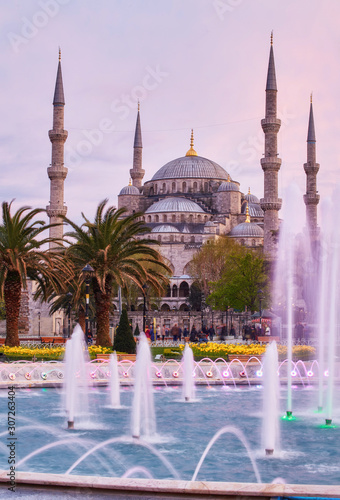 fountain on the background of the Mosque photo