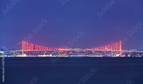 Bosporus Bridge at night in Istanbul photo