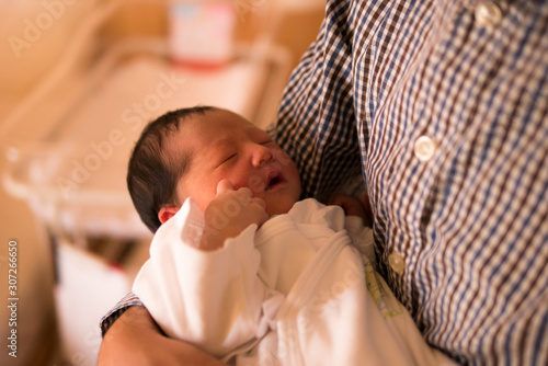 Japanese baby / held by father