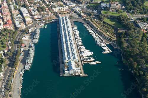 Aerial view of historic Woolloomooloo wharf with yachts and residential property