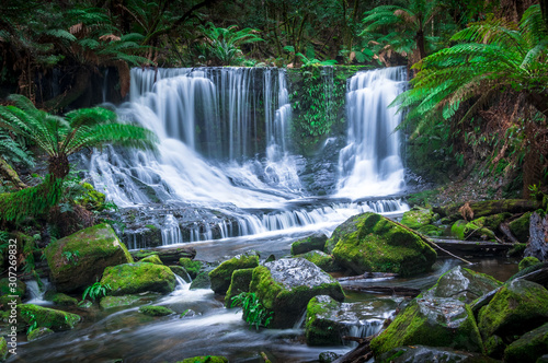 Fototapeta Naklejka Na Ścianę i Meble -  Beautiful tropical waterfall in secluded tropical location