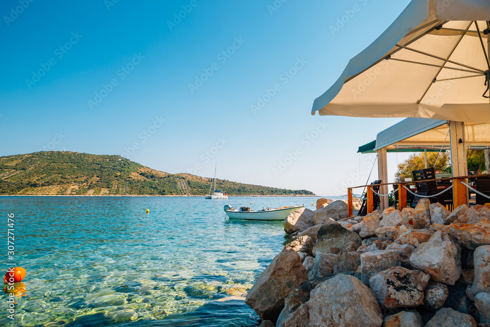 Adriatic beach at summer in Primosten, Croatia