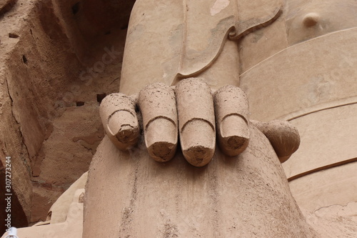 Buddha statue at Bingling Cave Temple in Yongjing, Gansu Province, China.UNESCO World heritage site.(Silk Roads: the Routes Network of Chang'an-Tianshan Corridor) photo