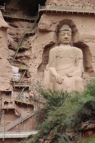 Buddha statue at Bingling Cave Temple in Yongjing  Gansu Province  China.UNESCO World heritage site. Silk Roads  the Routes Network of Chang an-Tianshan Corridor 