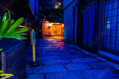 Night view of Ishibe-Koji Lane, a old traditional street in Kyoto, Japan. photo