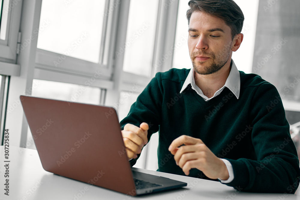 businessman working on laptop in office