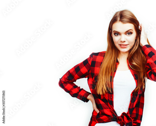 young pretty teenage hipster girl posing emotional happy smiling on white background, lifestyle people concept
