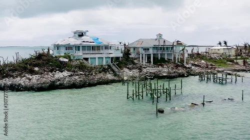 Destroyed houses on the beach from Hurricane Dorian in the Bahamas photo