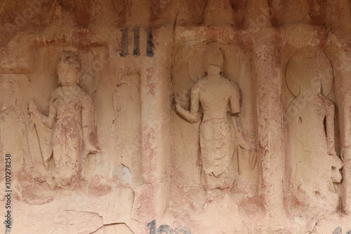 Buddhist sculpture in Bingling Temple and grottoes, Yongjing, Gansu Province, China.UNESCO World heritage site.(Silk Roads: the Routes Network of Chang'an-Tianshan Corridor) photo