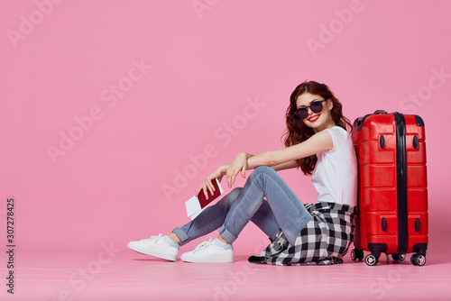 young woman with suitcase