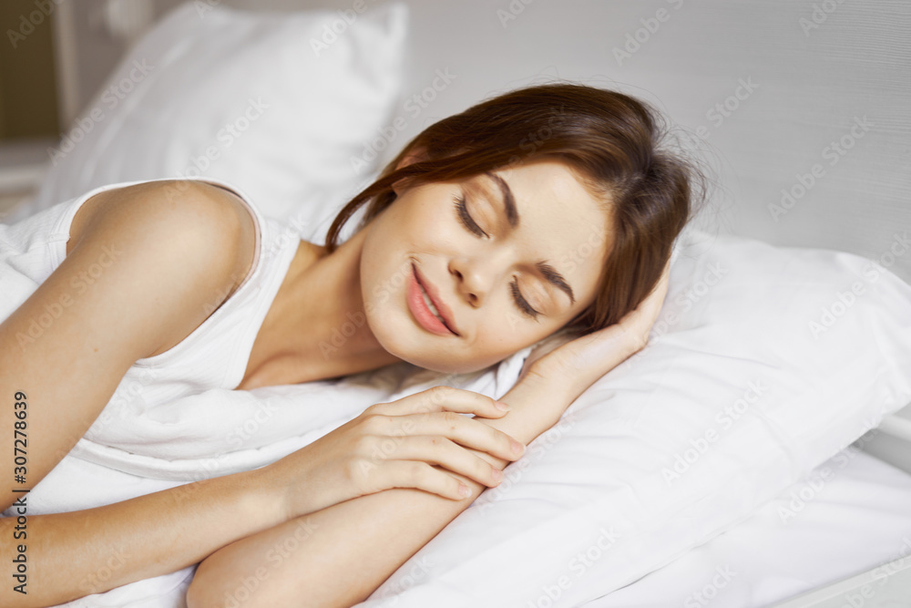 young woman sleeping on her bed young woman sleeping on her bed