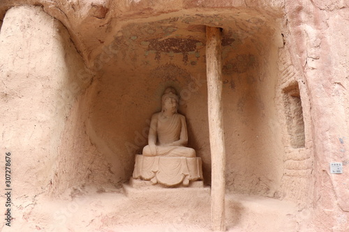 Buddhist sculpture in Bingling Temple and grottoes, Yongjing, Gansu Province, China.UNESCO World heritage site.(Silk Roads: the Routes Network of Chang'an-Tianshan Corridor) photo