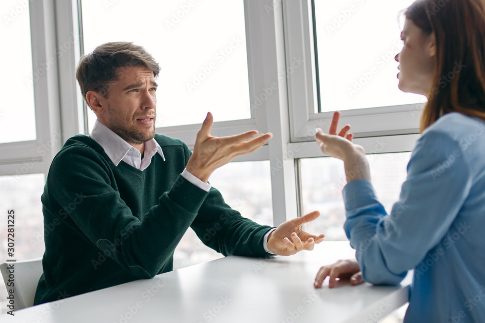 business people shaking hands in an office business people shaking hands in an office