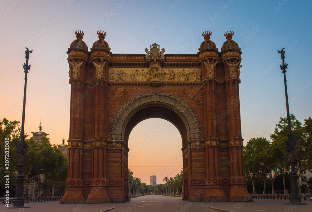 Arch of Triumph at sunrise in ciutadella park, Barcelona, Spain