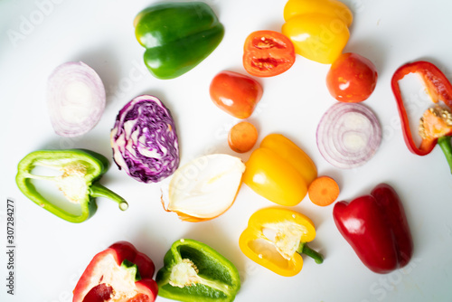 Various beta carotene fresh fruit and vegetable on white background