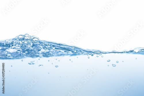 Water splash. Aqua flowing in waves and creating bubbles. Drops on the water surface feel fresh and clean. isolated on white background.