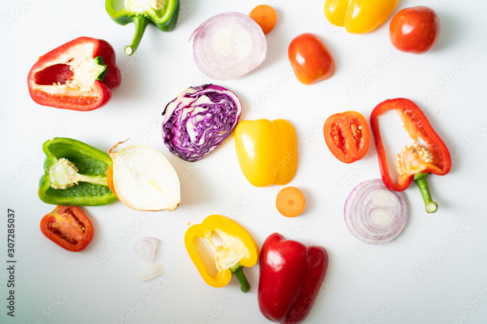 Naklejka premium Various beta carotene fresh fruit and vegetable on white background