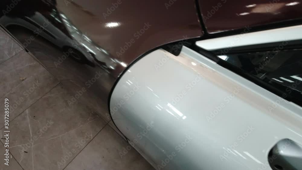 Vinyl wrap application before and after on silver car Vinyl wrap application before and after on silver car