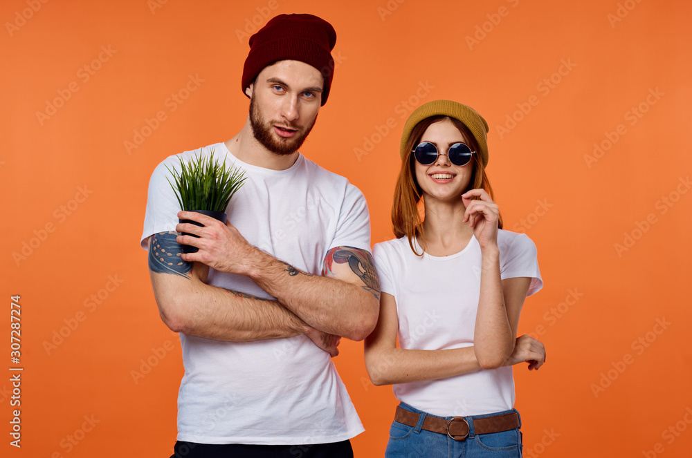 Obraz premium cheerful young couple in t-shirts