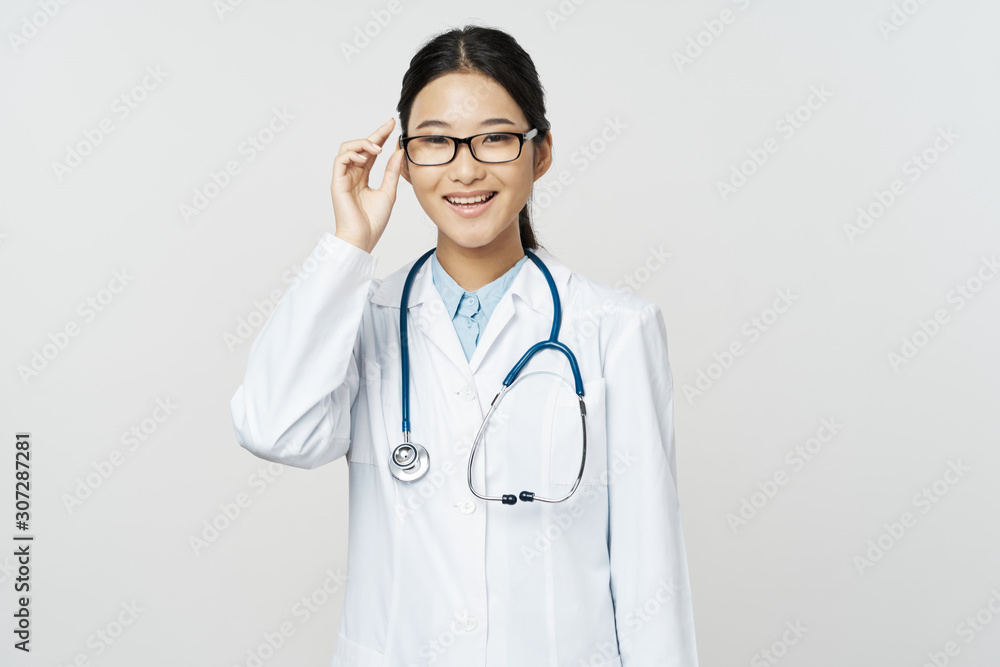 portrait of a female doctor with stethoscope