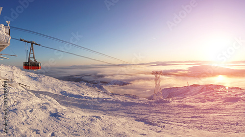 Cable car cabin at beautiful slopes.