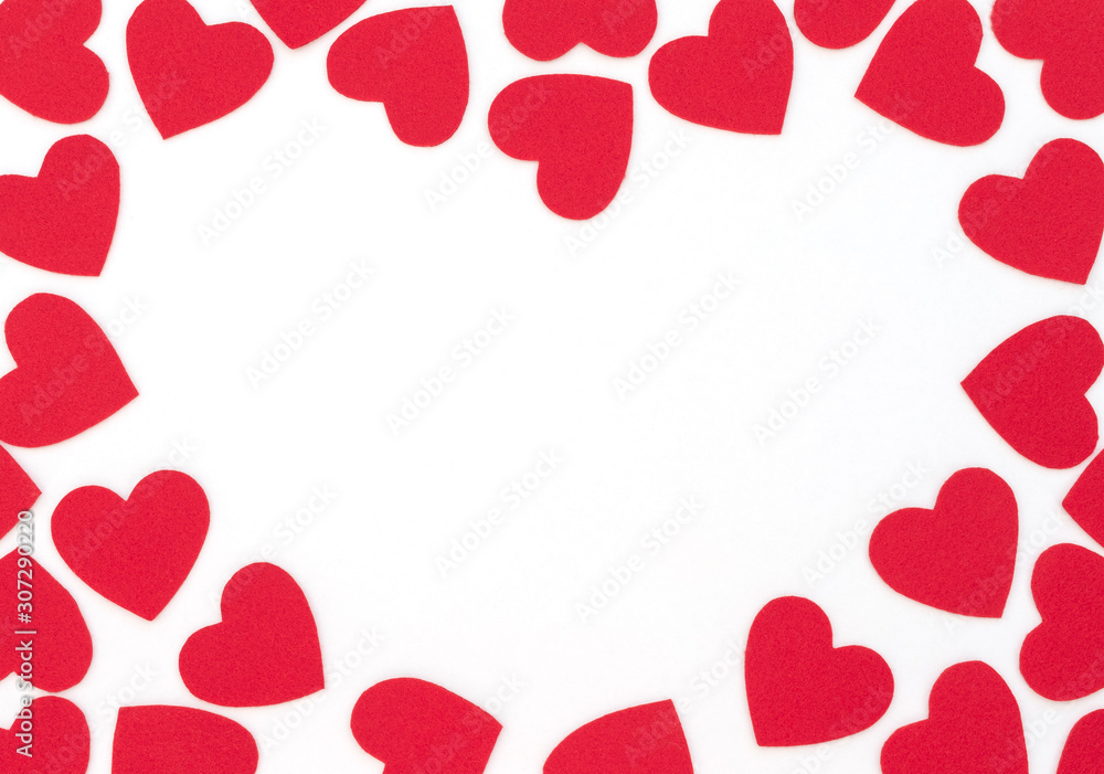 Valentine's Day white background with red hearts and copy space. Valentine greeting card. Flat lay style. 