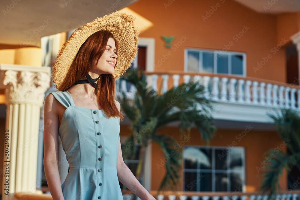 young woman on balcony