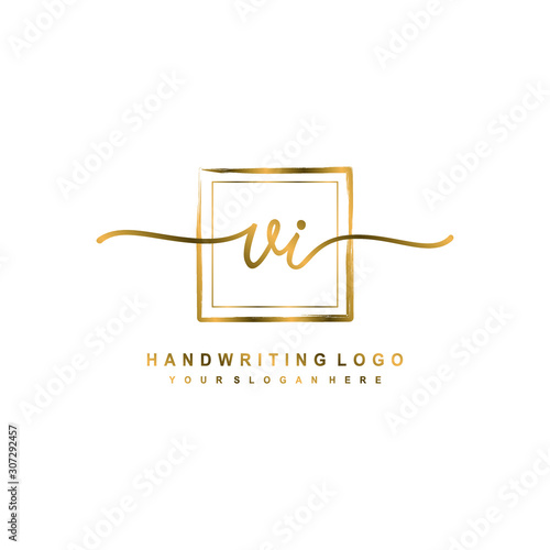 Initial V I handwriting logo design, with brush box lines gold color. handwritten logo for fashion, team, wedding, luxury logo.