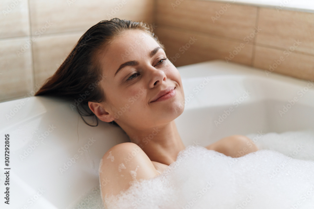 young woman in bath young woman in bath