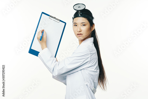 female doctor with clipboard