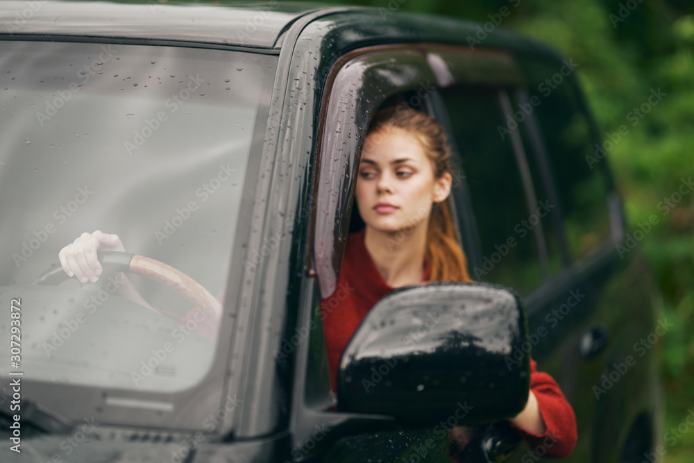 young woman in car young woman in car