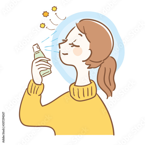 A woman spraying her face to block pollen