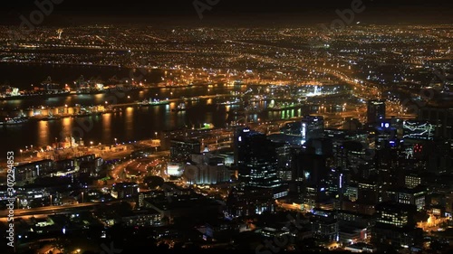 Night Time Lapse elevated view of Cape Town Central Business District and International Commercial Harbor Port