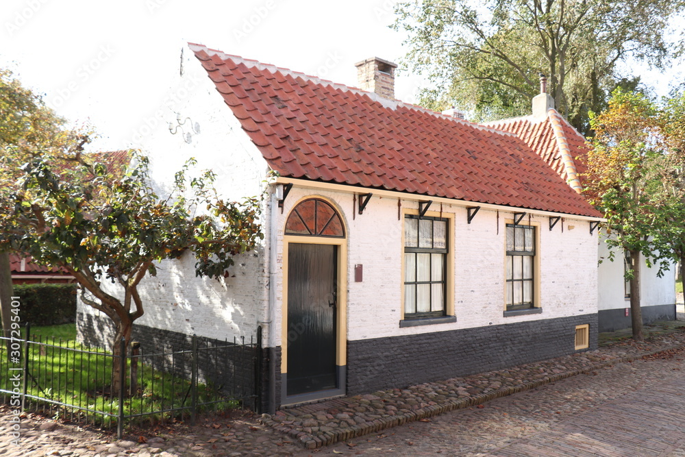 Enkhuizen, the Netherlands - October 12th 2018: 19th century fisherman house Enkhuizen, the Netherlands - October 12th 2018: 19th century fisherman house