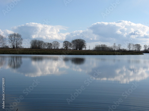 beautiful landscape with clouds above the water