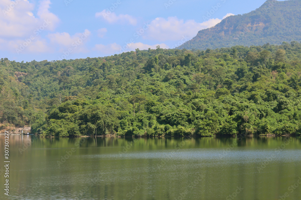 Water in lake with forest lake shore view. Water in lake with forest lake shore view.