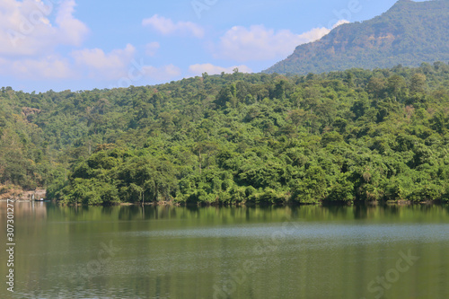 Water in lake with forest lake shore view.