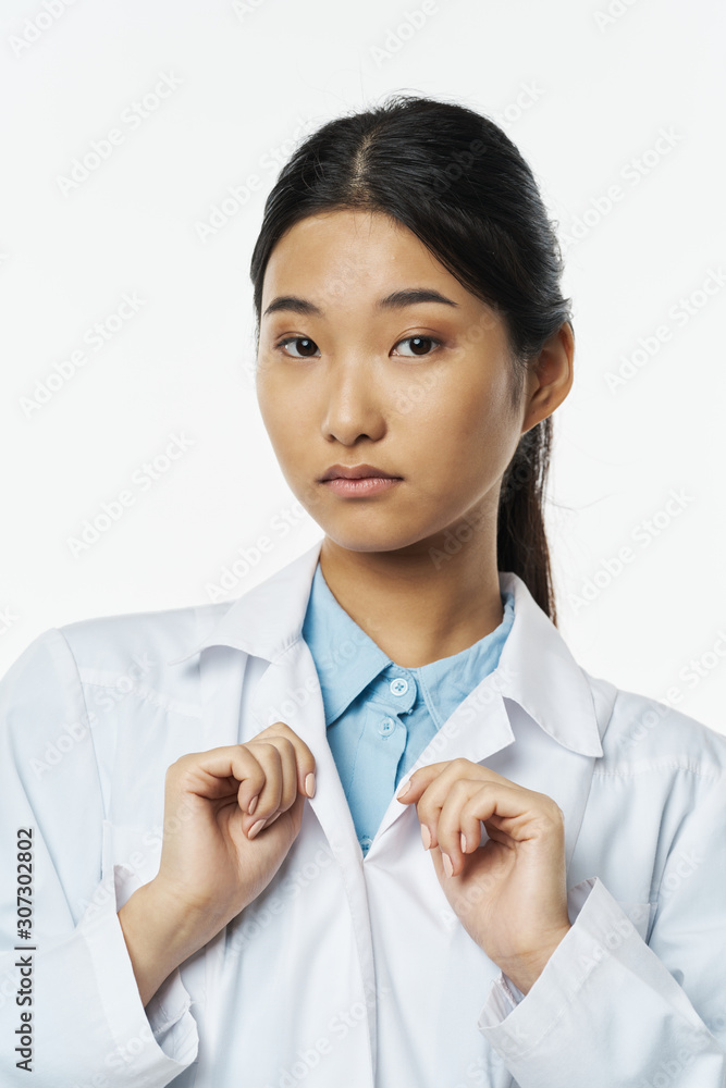 portrait of a female doctor with stethoscope isolated on white portrait of a female doctor with stethoscope isolated on white