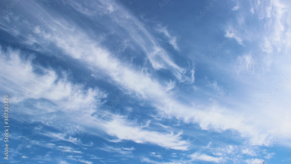Morning July dark blue sky, like the waves of the sea Morning July dark blue sky, like the waves of the sea