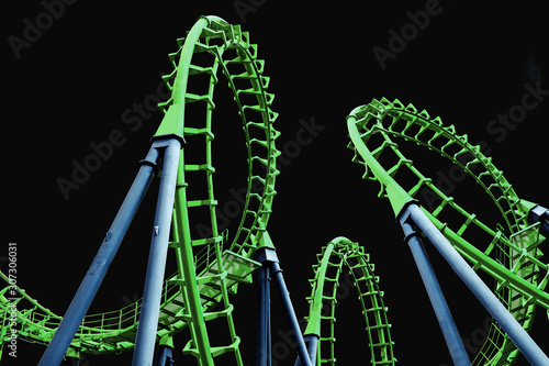 Quadro em tela Colorful  roller coaster isolated on black background