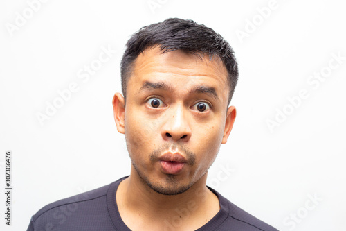 Portrait of amazing facial expression asian men face on white background