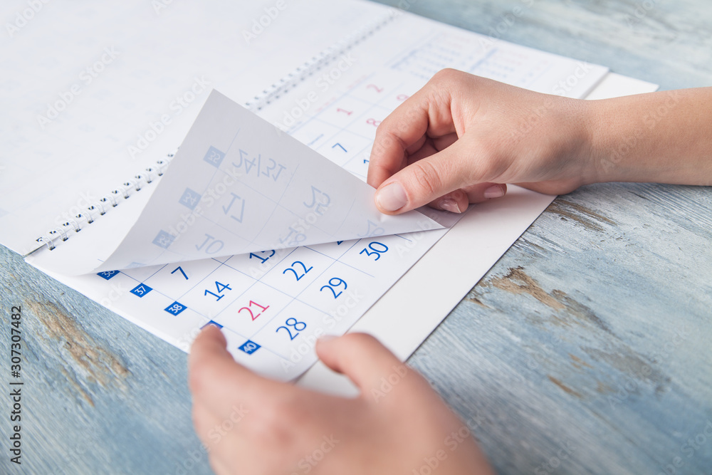 Girl holding calendar in the desk. Girl holding calendar in the desk.