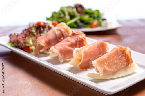 Parma ham served with cantaloupe