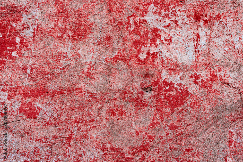 Texture of a concrete wall with cracks and scratches which can be used as a background Texture of a concrete wall with cracks and scratches which can be used as a background