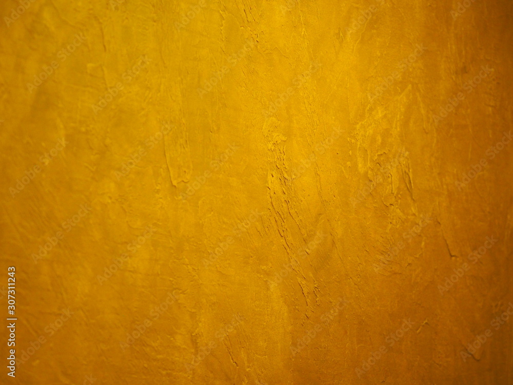 surface of the wall is rough, paint in gold texture material background