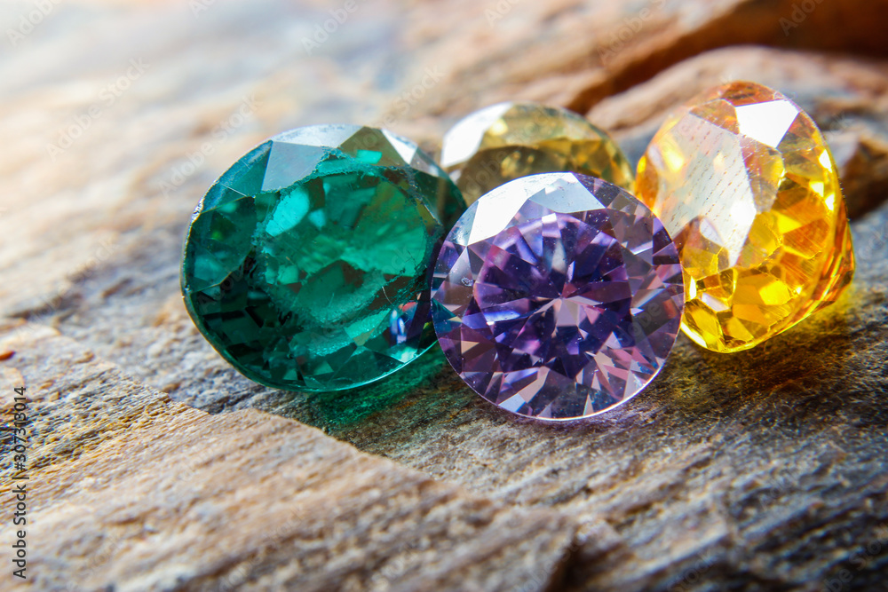 Natural Sapphire gemstone, Jewel or gems on black shine color, Collection of many natural gemstones on stone Natural Sapphire gemstone, Jewel or gems on black shine color, Collection of many natural gemstones on stone