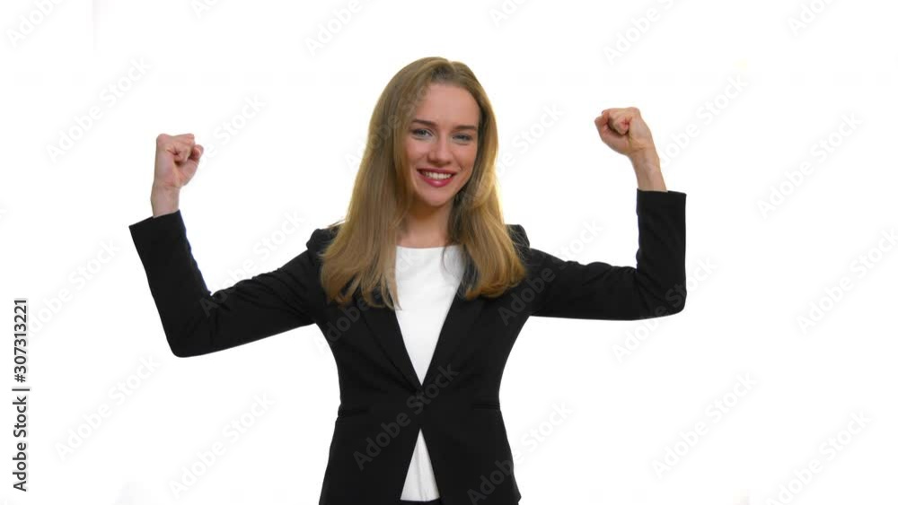 Girls power and feminism concept. Powerfull business woman boss showing her muscle, over white studio background. Girls power and feminism concept. Powerfull business woman boss showing her muscle, over white studio background.